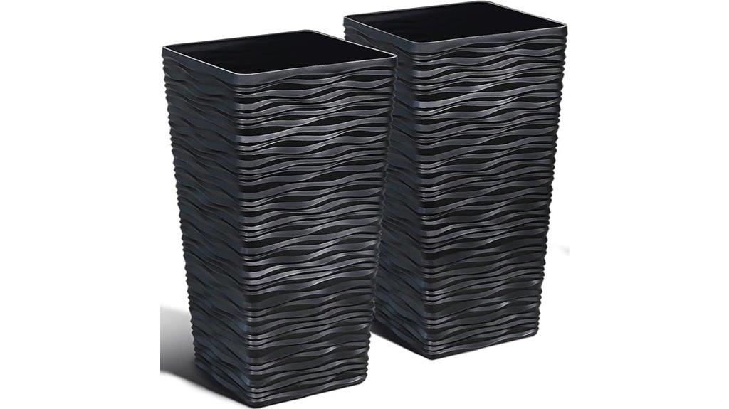 two black tall planters