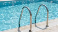 secure pool handrail placement
